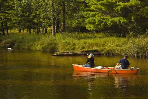 adventure boat canoe couple